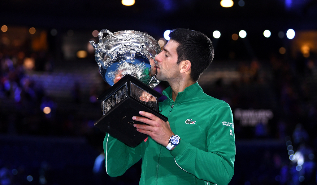 Novak-Djokovic-with-2020-Australian-Open-trophy-from-PA.jpg