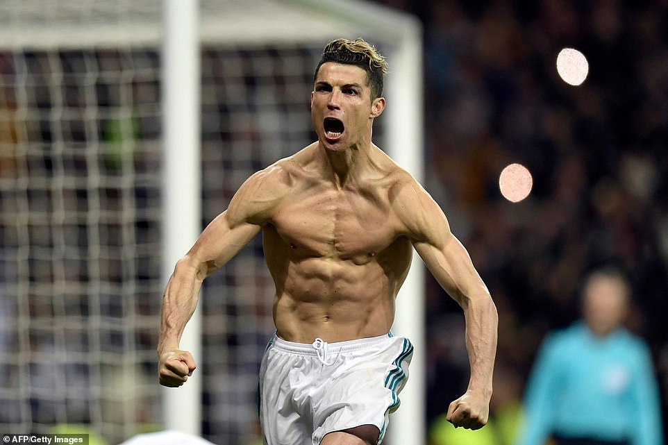 37969078-9143821-In_2018_the_shirtless_celebration_of_Ronaldo_was_in_full_flow_ag-a-26_1610913157837.jpg